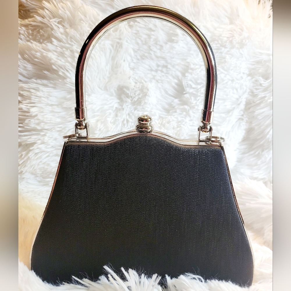 Vintage-inspired black and chrome pocketbook